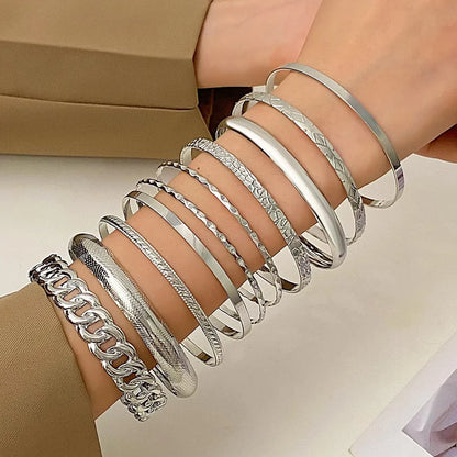 Bohemisk armbåndssæt i ti dele i guld- og sølvfarve