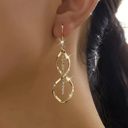 Sunbeam Spiral Øreringe | Guld