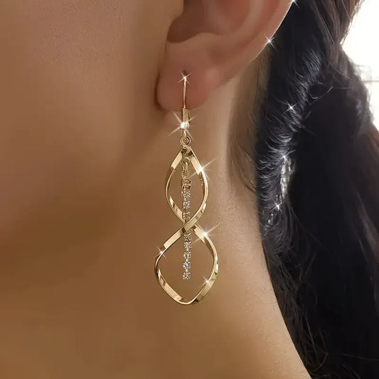 Sunbeam Spiral Øreringe | Guld